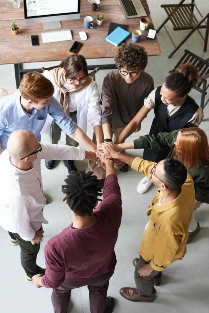 eight people doing team work