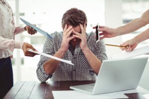 Businessman stressed out at work Businessman stressed out at work