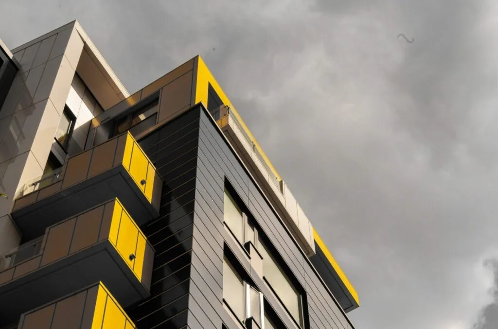 Housing Sector Housing Sector block of modern flats amidst a grey sky