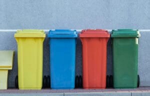 Colourful bins in a row to represent simpler recycling regulations Colourful bins in a row to represent simpler recycling regulations