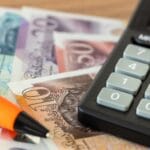 Autumn Budget: What SMEs Should Be Thinking About 2 british money with a calculator and pen to represent the autumn budget