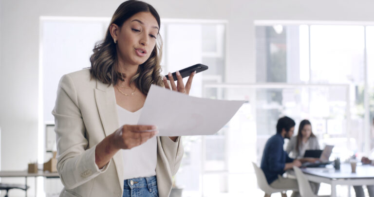 woman on loudspeaker holding contract for auto-renew