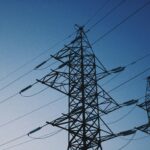 Why Your SME Is Paying More for Energy Than It Should 1 pylons against dark sky representing energy for smes