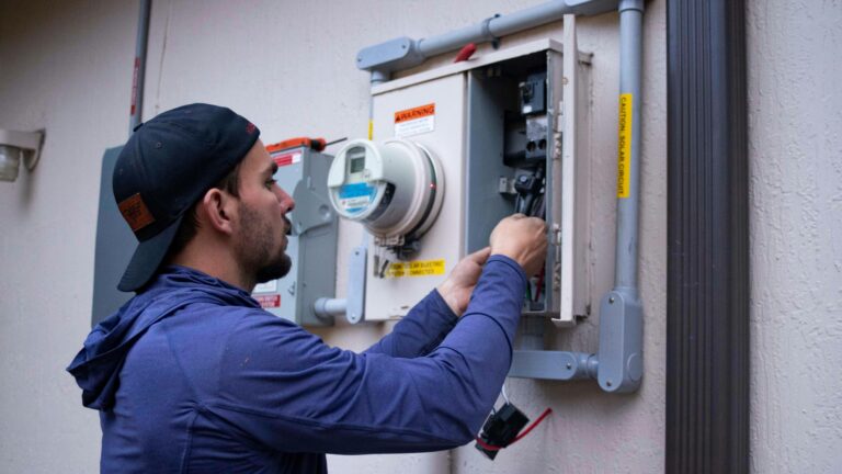 engineer upgrading business energy meter